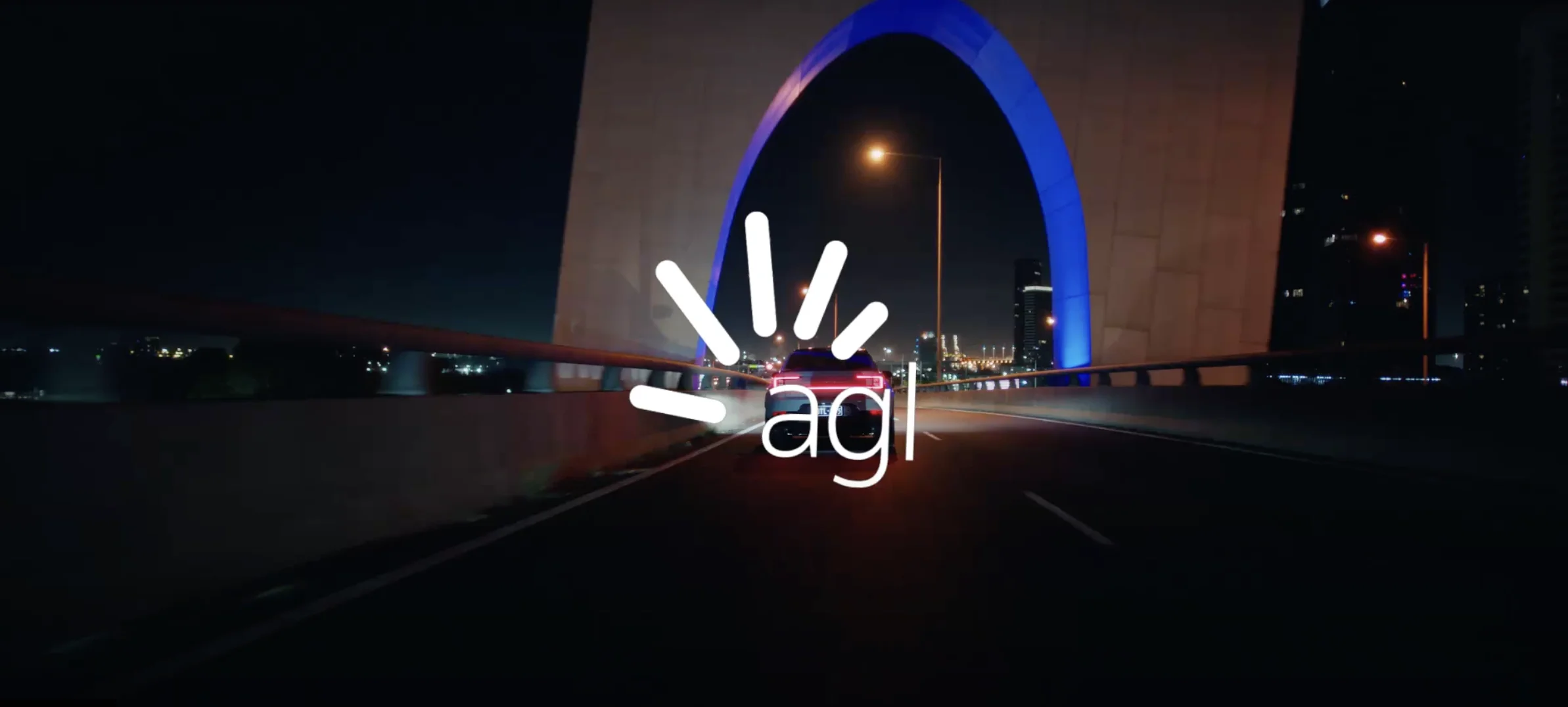 AGL logo with the city landscape in the background.